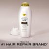 OGX Nourishing + Coconut Milk Shampoo, Hydrating & Restoring Shampoo Moisturizes for Soft Hair After the First Use, Paraben-Free, Sulfate-Free Surfactants, 25.4 fl. oz view 2