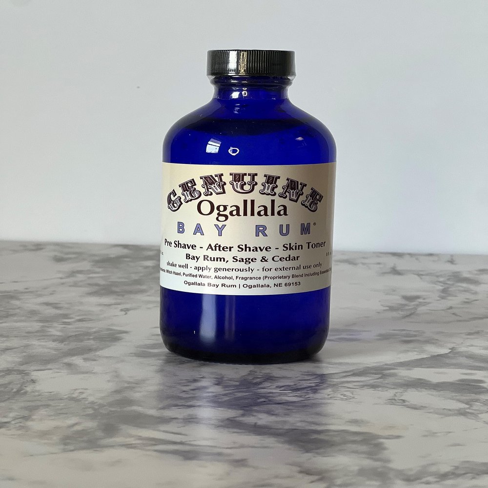 8oz Genuine Ogallala Bay Rum Sage and Cedar Aftershave. Old-time looking bottle and label.