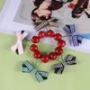 Lurrose 5pcs Cherry Shape Bow Hair Clips for Girls Colorful Grosgrain Ribbon Barrettes Hair Accessories for Parties Birthdays and Special Occasions Green Black Brown Stripes view 3