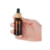 10Pcs 15ml/0.5oz Amber Glass Dropper Bottle with Black Rubber Head and Bamboo Lid Eye Dropper Bottle Portable Empty Makeup Storage Container Beauty Holders Dispenser for Essential oil view 2