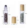 10Pcs 10ml Natural Semiprecious Stones Essential Oil Roller Bottles Clear Glass Roll-on Bottles Gemstone with Wooden Caps and Healing Crystal Chips Inside view 2