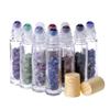 10Pcs Clear 10ml Thick Glass Roll on Bottles Vials Travel Containers Massage Roller Bottle with Gemstone Roller Ball for Essential Oils Perfume Cosmetic, Gemstone Chips Inside (Plastic Wood Grain Cap) view 1