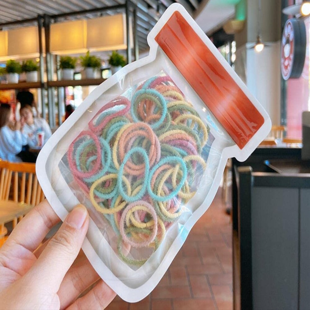 Milk Cup Ziplock Bag Carrying Bag Children's Color 100 Simple Small Rubber Bands Children's Hair Accessories Set (Green yellow orange)