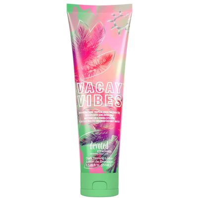 Devoted Creations Vacay Vibes Tanning Lotion Indoor/Outdoor Tropical Bronzing Cocktail Infused with Skin Quenching Watermelon and Guava Extracts, plus Electrolyte Enhanced Coconut Water 8.5 oz.