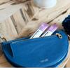 The Go Essentials travel amenities kit includes single packets of shampoo/conditioner, mouthwash, body lotion, and body wash. view 3