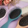 Essential Oval Hair Brush by BeaverStrong, Detangling Hair Brushes with capped soft nylon bristles and air cushion base (Light Peach) view 3