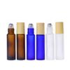 10 Pcs Frosted Glass Essential Oils Roll on Bottles,10ml Refillable Massage Roller Bottles Perfume Bottles with Stainless Steel Ball Wood Grain Cap Empty Travel Roller Essential Oils Vials(Brown) view 2