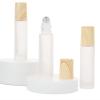 10-Pack 10ml Frosted Glass Roller Bottle Essential Oils Perfume Cosmetic Roll-on Bottle with Metal Roller Ball and Wood Grain Plastic Cap view 1