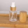 COSIDEA 6 pcs Empty 1oz / 30ml bamboo lids clear glass bottle with lotion pump dispenser, refillable emulsion cosmetic cream bottles, toiletries refill travel container view 3