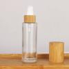 COSIDEA 6 pcs Empty 2oz / 60ml bamboo lids clear glass bottle with lotion pump dispenser, refillable emulsion cosmetic cream bottles, toiletries refill travel container view 3