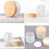 4Pack 50g Frosted Glass Cosmetic Jars, Empty Sample Containers with Wood Grain Lids for Lotion, Lip Balm, Eye Cream, Scrubs, Oils, Salves, Ointments (White) view 2