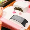 Uonlytech 3pcs Comfortable Nail Art Cushion Arm Rest Pillow Black Silicone Hand Holder for Nail Salon Easy to Clean Firm Support for Manicure Tables view 3