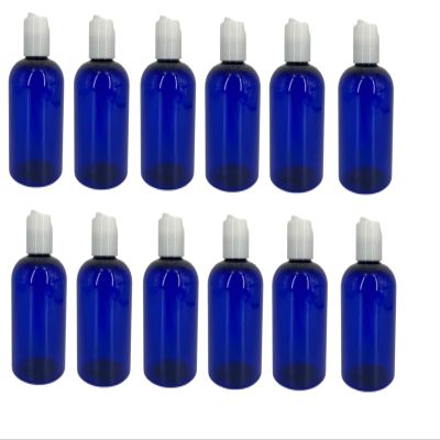 Natural Farms 4 oz Blue Boston Plastic Bottles -12 Pack Empty Bottle Refillable - BPA Free - Essential Oils - Aromatherapy | White Press Down Disc Cap - Made in the USA