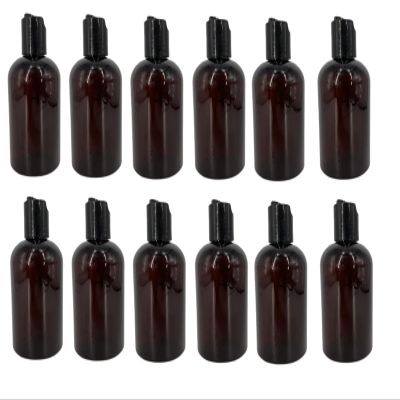 Natural Farms 4 oz Amber Boston Plastic Bottles -12 Pack Empty Bottle Refillable - BPA Free - Essential Oils - Aromatherapy | Black Press Down Disc Cap - Made in the USA