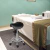Kcelarec Saddle Stool with Foot Rest PU Leather Swivel Adjustable Rolling Stool with Wheels Facial Salon Chair (Black) view 2