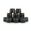 Nature Packaged Glass Amber 1oz Jar - 12 Packs, Empty Round Jars For Beauty Products, Lotion, and Powders - Black Lid - Small Candle Jars view 1
