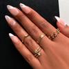 CHIC SWIRL Press-On Nails by Lavaa Beauty | Medium Almond | White Swirl Design on Nude Base view 1