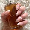 CHIC SWIRL Press-On Nails by Lavaa Beauty | Medium Almond | White Swirl Design on Nude Base view 3