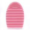 KALLORY Silicone Makeup Brush Cleaning Egg Hand-held Cosmetic Tool for Effortless Brush Care Durable and Design for Home and Travel Use Pink view 2