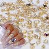 Dornail 50pcs Gold Nail Charms for Acrylic Nails, Mix Styles Shiny Pearl Alloy Nail Rhinestones Flower Butterfly Heart Star Charms for Nails Women Nail Jewels Nail Decorations for Nail Art Charms view 1