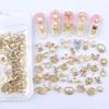 Dornail 50pcs Gold Nail Charms for Acrylic Nails, Mix Styles Shiny Pearl Alloy Nail Rhinestones Flower Butterfly Heart Star Charms for Nails Women Nail Jewels Nail Decorations for Nail Art Charms view 4