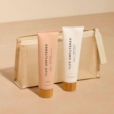 + Lux Unfiltered First Class Glow Travel Kit - Includes N32 Gradual Self Tanner & N14 Body Cream in Santal - Travel Size Self Tanner & Body Lotion with Water-Resistant Cosmetic Pouch - 3.4 fl oz
