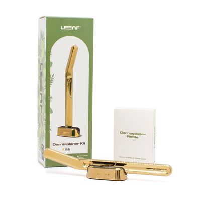 Leaf Shave | Leaf Dermaplaner Kit, All-Metal Reusable Dermaplane Razor and Exfoliating Tool for Women, Includes Matching Stand and 10-Pack of Refills - Gold