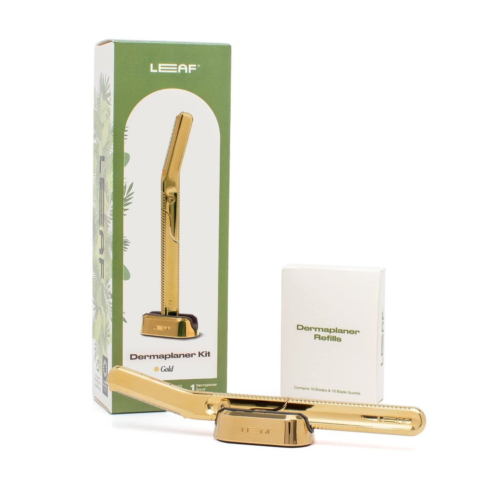 Leaf Shave | Leaf Dermaplaner Kit, All-Metal Reusable Dermaplane Razor and Exfoliating Tool for Women, Includes Matching Stand and 10-Pack of Refills - Gold