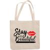 12oz Canvas Tote Bag - Stay Beautiful with Red Lips & Eyeliner Design - Beauty Themed Merch for Makeup Artist or Cosmetologist, Gift for Makeup Lovers & Beauticians view 1