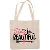 12oz Canvas Tote Bag - Girly Stay Beautiful Quote with Eyelash, Lipstick, Brush, Heart & Arrow Design - Beauty Themed Merch for Makeup Artist or Cosmetologist, Gift for Makeup Lovers & Beauticians view 1