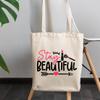 12oz Canvas Tote Bag - Girly Stay Beautiful Quote with Eyelash, Lipstick, Brush, Heart & Arrow Design - Beauty Themed Merch for Makeup Artist or Cosmetologist, Gift for Makeup Lovers & Beauticians view 3