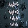24 Pcs Halloween Press on Nails Long Coffin Fake Nails Black White French Tip Glue on Nails with Ghost Spider Web Designs Glossy Full Cover False Nails Acrylic Nails Square Stick on Nails for Women view 2