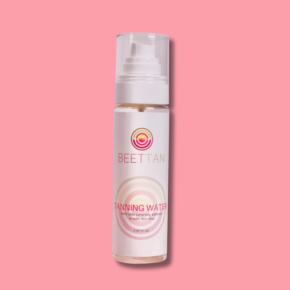 Tanning Water with color correcting additives to even skin tone