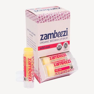 Zambeezi Wild Rose Carton - Crafted with lip-soothing organic, Fair Trade ingredients, youll go wild for this sweet, floral lip balm. It's like gifting yourself a bouquet of roses.