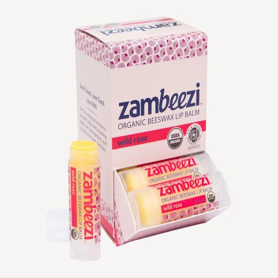 Zambeezi Wild Rose Carton - Crafted with lip-soothing organic, Fair Trade ingredients, youll go wild for this sweet, floral lip balm. It's like gifting yourself a bouquet of roses.
