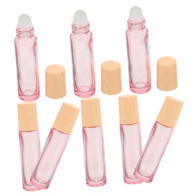 FRCOLOR 8pcs Refillable Essential Oil Roller Bottles Compact Pink Glass with Wood Grain Cap Perfume Sub Bottles for Travel and Daily Use