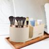 Baluue Rotating Makeup Brush Holder Multiple Compartments Stylish and Functional Makeup Organizer for Vanity Bathroom Countertop Design Creamy view 2