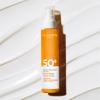 Clarins Body Sunscreen Lotion Spray | Broad Spectrum SPF 50+ | UVA/UVB Protection | Lightweight and No White Cast | Enriched with Antioxidants | All Skin Types, including Sensitive Skin | 5 Ounces view 4