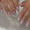 24 Pcs Almond Press on Nails Medium Nude Full Cover Stick on with Silvery Glitter Designs Acrylic Glossy False 3D Water Ripple Charms French for Women Girls view 2