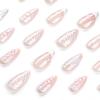 24 Pcs Almond Press on Nails Medium Nude Full Cover Stick on with Silvery Glitter Designs Acrylic Glossy False 3D Water Ripple Charms French for Women Girls view 4