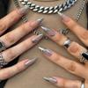 CEWEWP 24 Pcs Almond Press on Nails Medium French Tip Fake Nails Nude False Nails with 3D Silver Nail Charms Designs Glossy Glue on Nails Full Cover Stick on Nails for Women Girls Acrylic Nails view 1