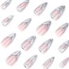 CEWEWP 24 Pcs Almond Press on Nails Medium French Tip Fake Nails Nude False Nails with 3D Silver Nail Charms Designs Glossy Glue on Nails Full Cover Stick on Nails for Women Girls Acrylic Nails view 2
