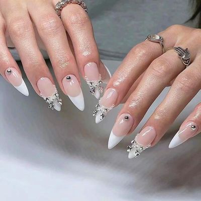 CEWEWP Medium Press on Nails Almond False Nails White French Tip Fake Nails Silver Bow Tie Pearl Glue on Nails Artificial Acrylic Nails 24Pcs Full Cover Reusable Coffin Nails Stick on Nails for Women