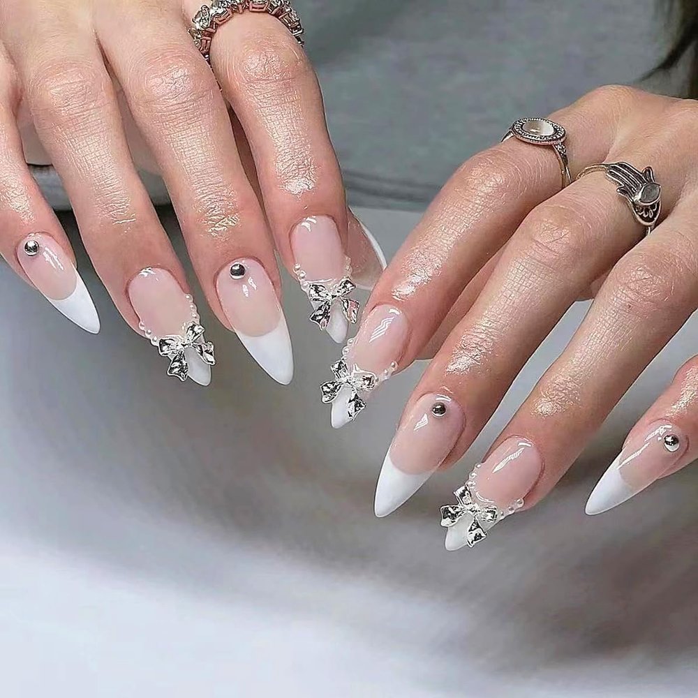 CEWEWP Medium Press on Nails Almond False Nails White French Tip Fake Nails Silver Bow Tie Pearl Glue on Nails Artificial Acrylic Nails 24Pcs Full Cover Reusable Coffin Nails Stick on Nails for Women