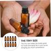 Baluue 10pcs Portable Glass Bottles for Essential Oils and Perfumes Durable Brown Vials with Orifice Reducer for Convenient Dispensing for Travel and Organization view 4