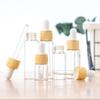 OHPHCALL 4pcs Wood Grain Glass Dropper Bottles Essential Oil Dispensers Durable Transparent Containers for Cosmetic Use Easy Press Dropper view 2