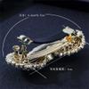 YMGSCC Hollow Pearl Bow Hair Clip Temperament Rhinestone Top Clip Hair Ornaments Hair Card Female view 4