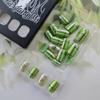 24Pcs St. Patrick's Day Press on Nails Short Square Fake Nails with Four Leaf Clover Glue on Nails Gold Glitter Full Cover False Nails Shamrock Acrylic Nails Irish Stick on Nails Gift for Women view 3