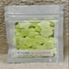 Green Matcha Soap Petal flakes. Perfect for guest bathrooms, party favors, baths, and travel or purse, these mini soap petals make washing hands or soaking in the tub a delightful experience. view 1