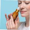 GANAZONO 4pcs Amber Glass Dropper Bottles Dispenser Graduated Scale Travel-friendly Refillable Vials for Oils and Liquids Stylish and Functional Design view 4